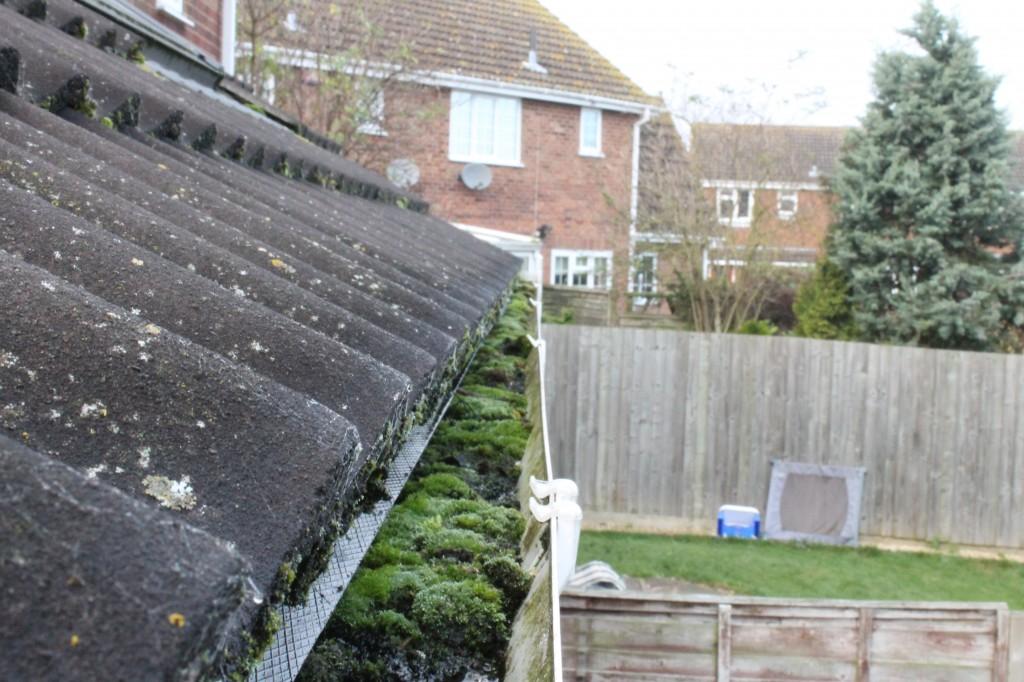 Gutter Cleaning Services blocked gutters before and after